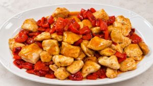 Pollo e peperoni in agrodolce con salsa cremosa